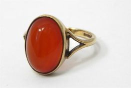 9ct gold and orange-coloured gem oval cabochon set