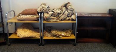 Pair of contemporary trollies, tubular steel frame