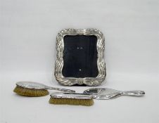 Silver plate photograph frame on a trestle support