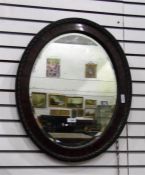 Early 20th century oval mahogany-framed bevelled p