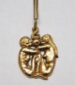 1970's 9ct gold 'Adam and Eve' pendant on chain, m