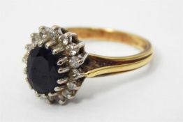 Gold, sapphire and diamond cluster ring, marks wor