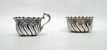 Silver cream jug with rococo foliate engraving and