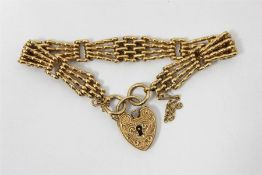 9ct gold flexible mesh bracelet and the heart-shap