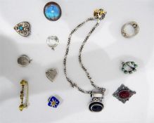 Silver and amethyst set, assorted silver jewellery, brooches, pendants, charms, necklaces, etc