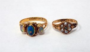 22ct gold and opal set ring set with three opals,