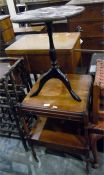 Modern reproduction wine table with four hinged fl