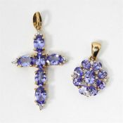 9ct gold crucifix set with six oval tanzanite ston