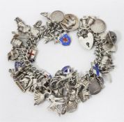 Silver charm bracelet having numerous enamelled sh