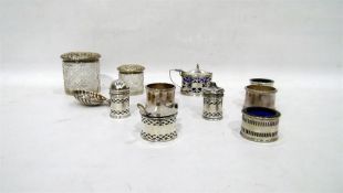 Three-piece silver condiment set with blue glass liners, three other assorted condiment items with