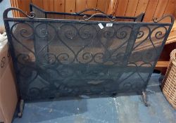 Two cast iron and wire spark guards (2)