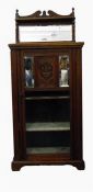 Edwardian mahogany music cabinet with mirrored bac