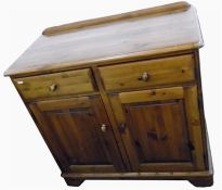 Modern pine cupboard fitted two drawers and two fi