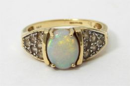 14ct gold, opal and simulated diamond ring, the ov