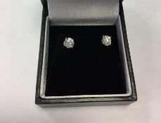 Pair solitaire diamond stud earrings, each approx 0.5ct
