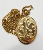 9ct gold locket on chain, engraved decoration, 26.