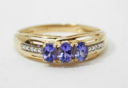 9ct gold, blue and white stone dress ring set thre