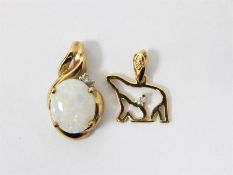 9ct gold and opal cabochon pendant with two tiny d