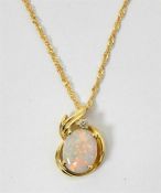 18ct gold, opal cabochon and diamond pendant on 18
