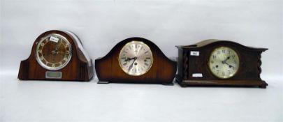 Circa 1920's carved oak eight-day mantel clock and