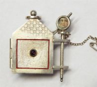 Silver 'Alice in Wonderland' locket brooch, maker'