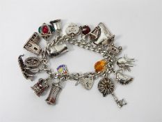 Three various silver charm bracelets, approx 120g