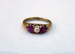 Gold coloured metal, pink stone and pearl three stone ring
