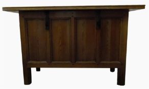 Light oak chest, panelled sides, lid fitted with m