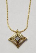 18ct gold and diamond star-shaped pendant on 18ct