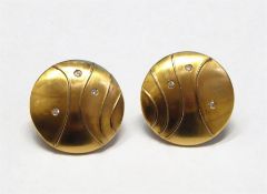 Pair of 18ct gold and diamond disc-shaped earrings