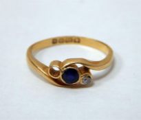 18ct gold three-stone sapphire and diamond ring in