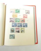 Three Stanley Gibbons albums, excellent condition, all containing commonwealth stamps