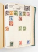 Two albums of modern GB from 1953, with select FDC cancels and two albums of world stamps, mostly