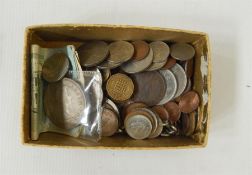 Small box of foreign coins including 1953 South African crown and 1/10th Kimiggram gold and three