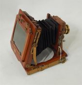 Early 20th century National plate camera with brass mounts, bellows and brass lens