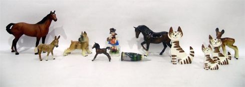 Beswick horse, another, a Beswick foal, a Beswick model of a donkey, a figure of a fawn (damaged)
