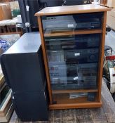 Pioneer music centre within a fitted unit and two large Pioneer speakers