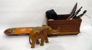 Carved wooden tusk decorated with buffalo, an African drum, a carved wooden African head, other