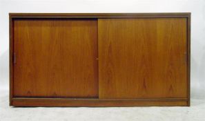 Teak finish cupboard enclosed by two sliding doors, 137cm wide