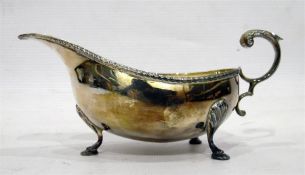 Silver sauce jug with gadrooned border, on cabriole-shaped feet, Birmingham maker's mark 'B&Co',