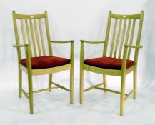 Pair of modern beech railback elbow chairs with pad seats