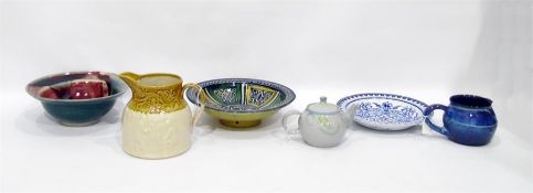 Studio pottery bowl with pink and turquoise glaze,