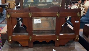 Wall mounted hat and coat stand having eight brass