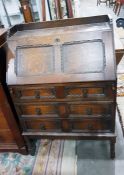 Circa 1920's oak bureau with geometric panelled dr