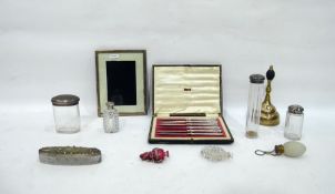 Silver rectangular photograph frame, a set of dess