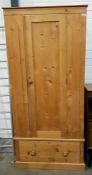 Pine single wardrobe with drawer to base, 82cm wid