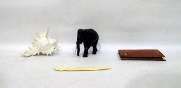 Lady's leather purse, a letter opener, a carved fi