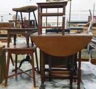 Lloyd Loom linen basket, an walnut stool raised up