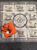 Hermes silk scarf - Couvertures et Tenues de Jour, taupe, 1974 Jacques Eudel, with original box, and