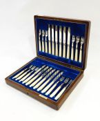 Set of 12 pairs Mappin & Webb silver and mother-of-pearl handled fruit knives and forks, line